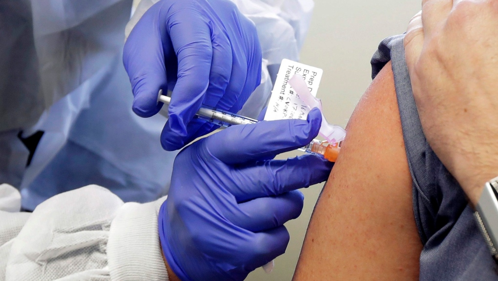 Person receiving COVID-19 vaccine
