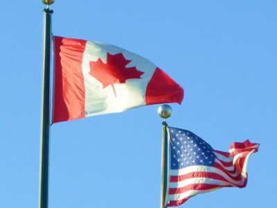 Canada US flags flying