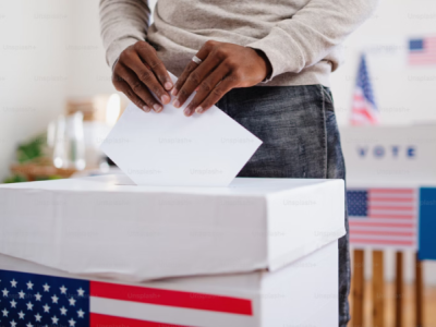 person casting ballot in US election